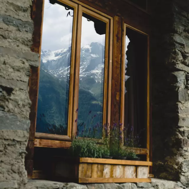 Reflections of snow-capped mountains